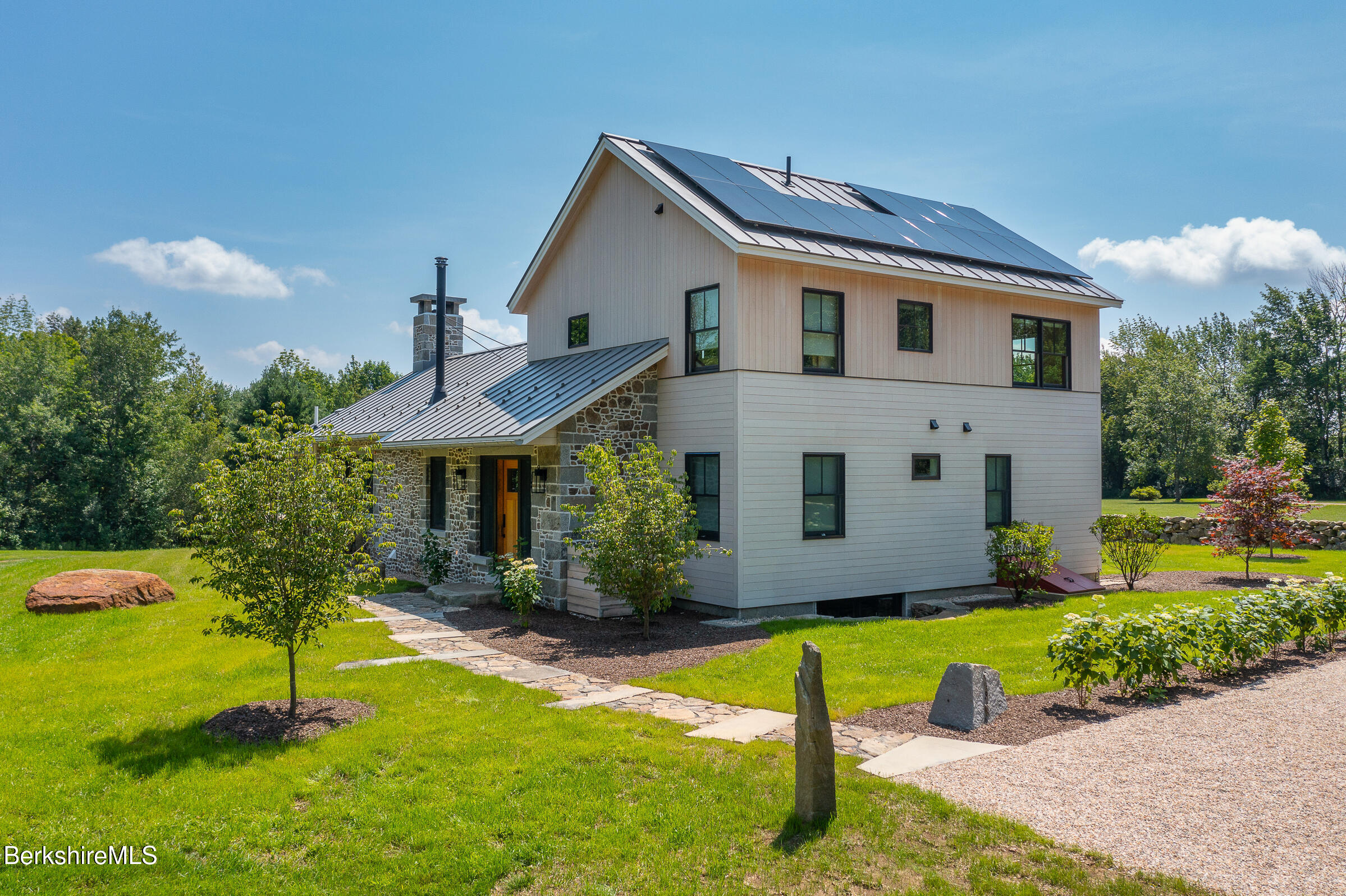194 Sandisfield Road Sandisfield, MA 01255 - Photo 11 of 59 a front view of house with a yard and trees
