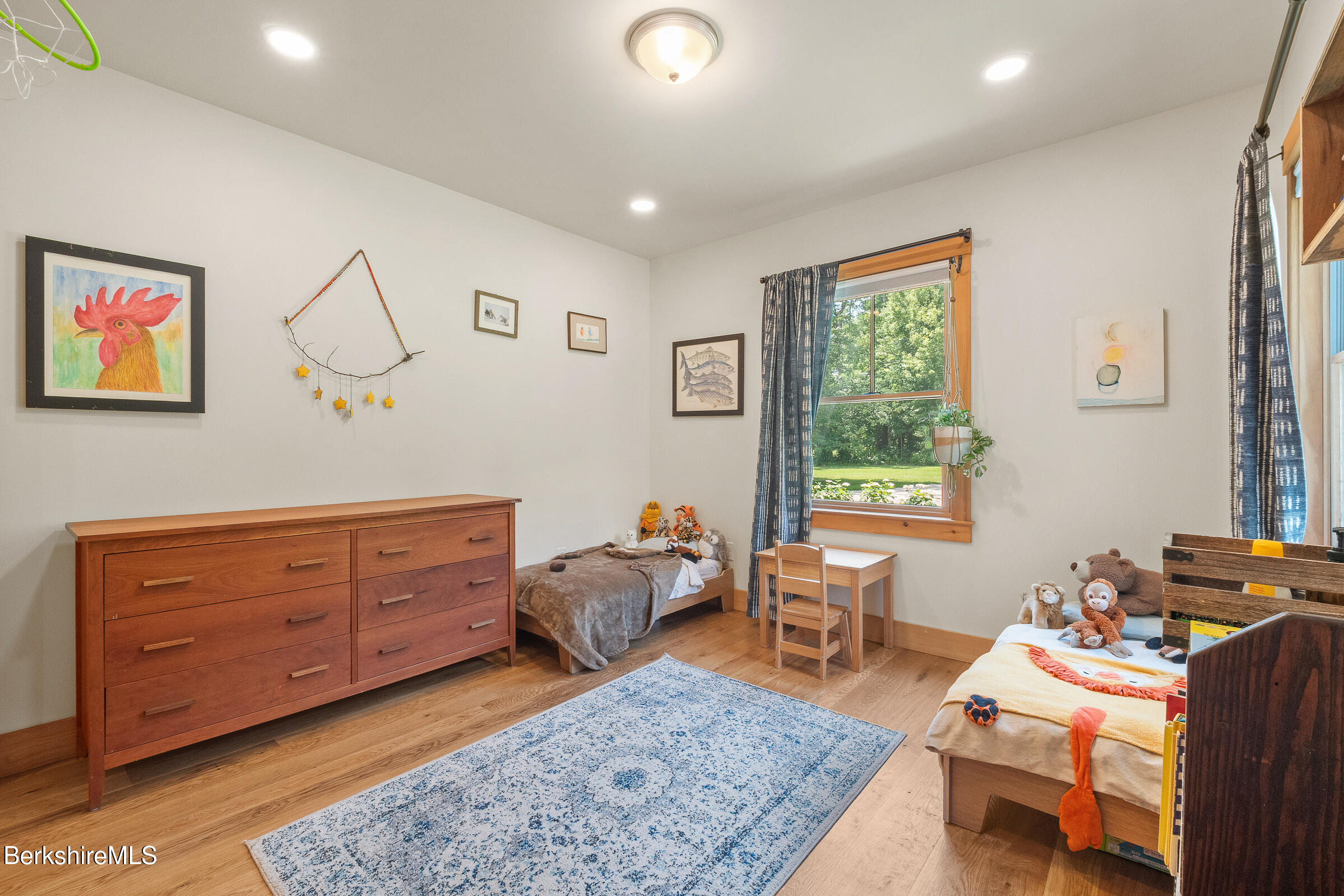 194 Sandisfield Road Sandisfield, MA 01255 - Photo 35 of 59 a room with wooden furniture and a window