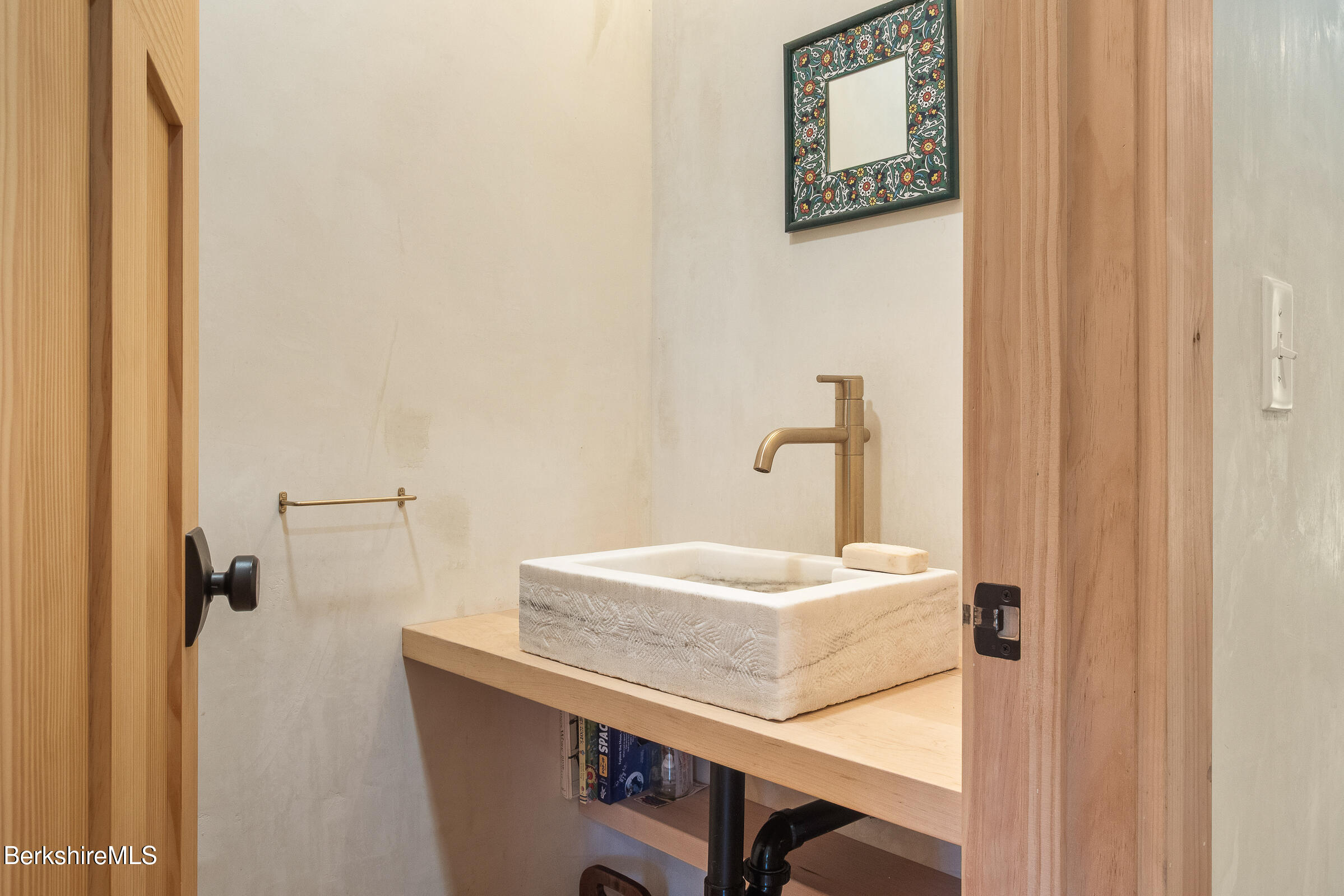 194 Sandisfield Road Sandisfield, MA 01255 - Photo 36 of 59 a bathroom with a sink and mirror