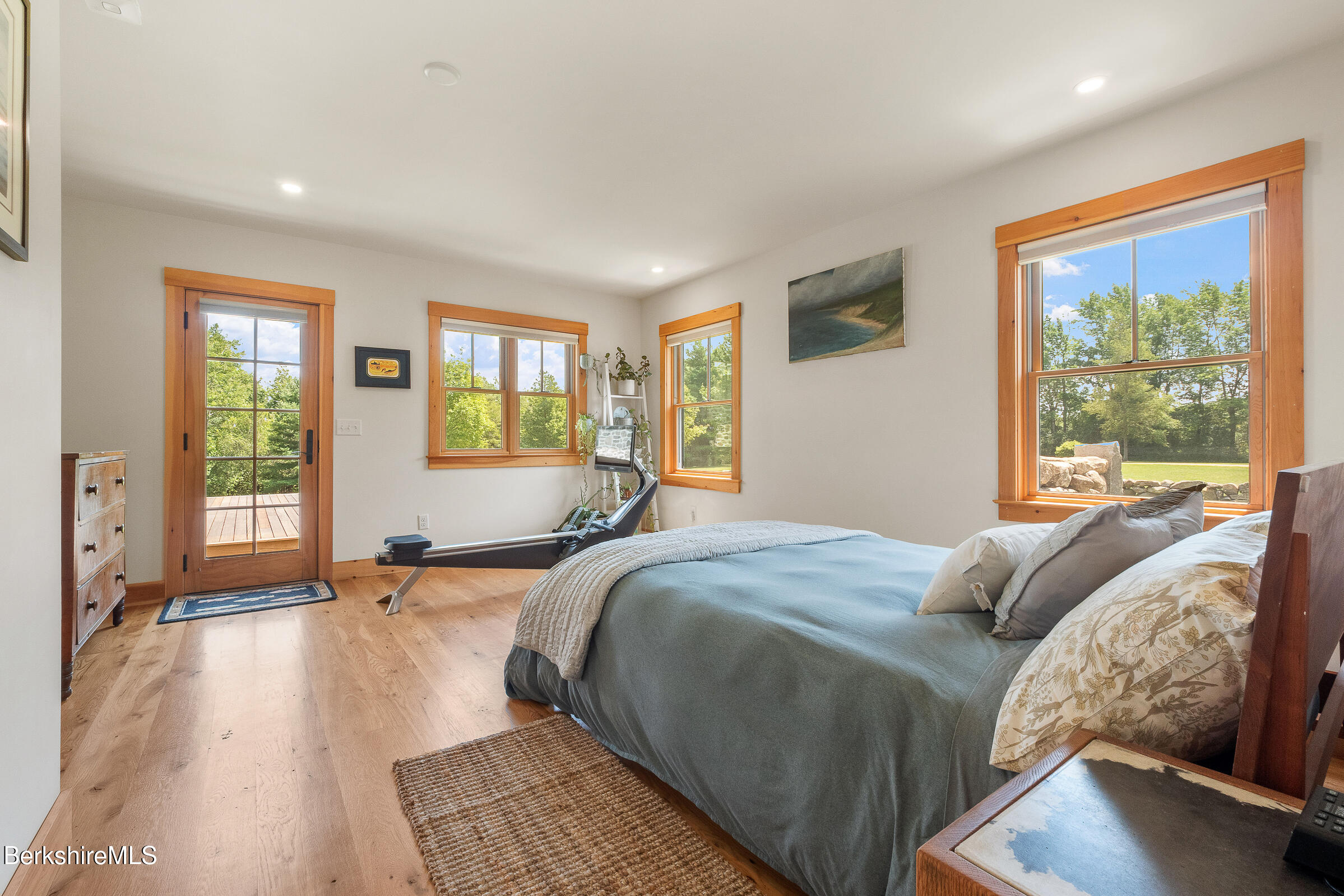 194 Sandisfield Road Sandisfield, MA 01255 - Photo 37 of 59 a bed sitting in a bedroom next to a window