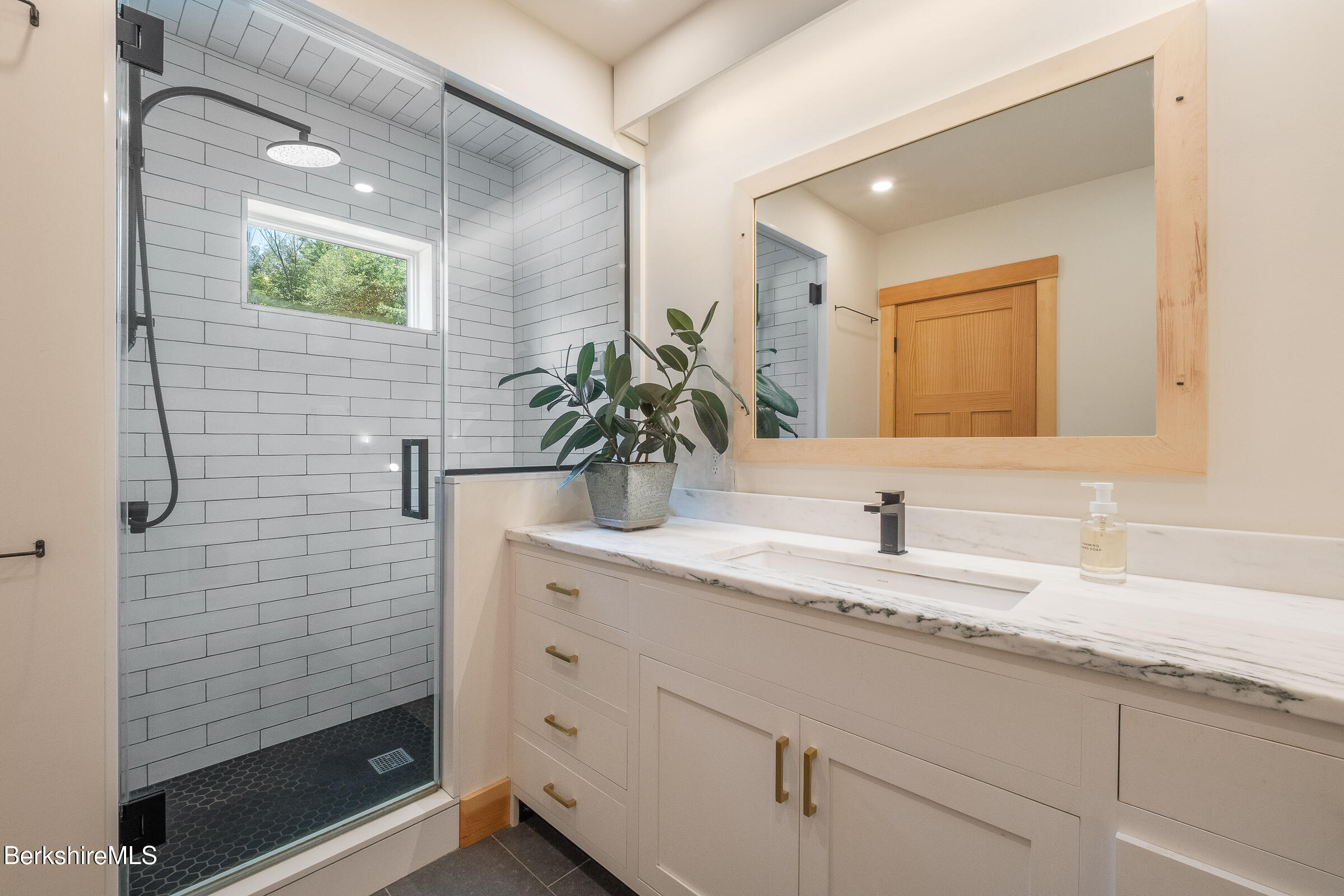 194 Sandisfield Road Sandisfield, MA 01255 - Photo 39 of 59 a bathroom with a granite countertop sink a shower and a mirror