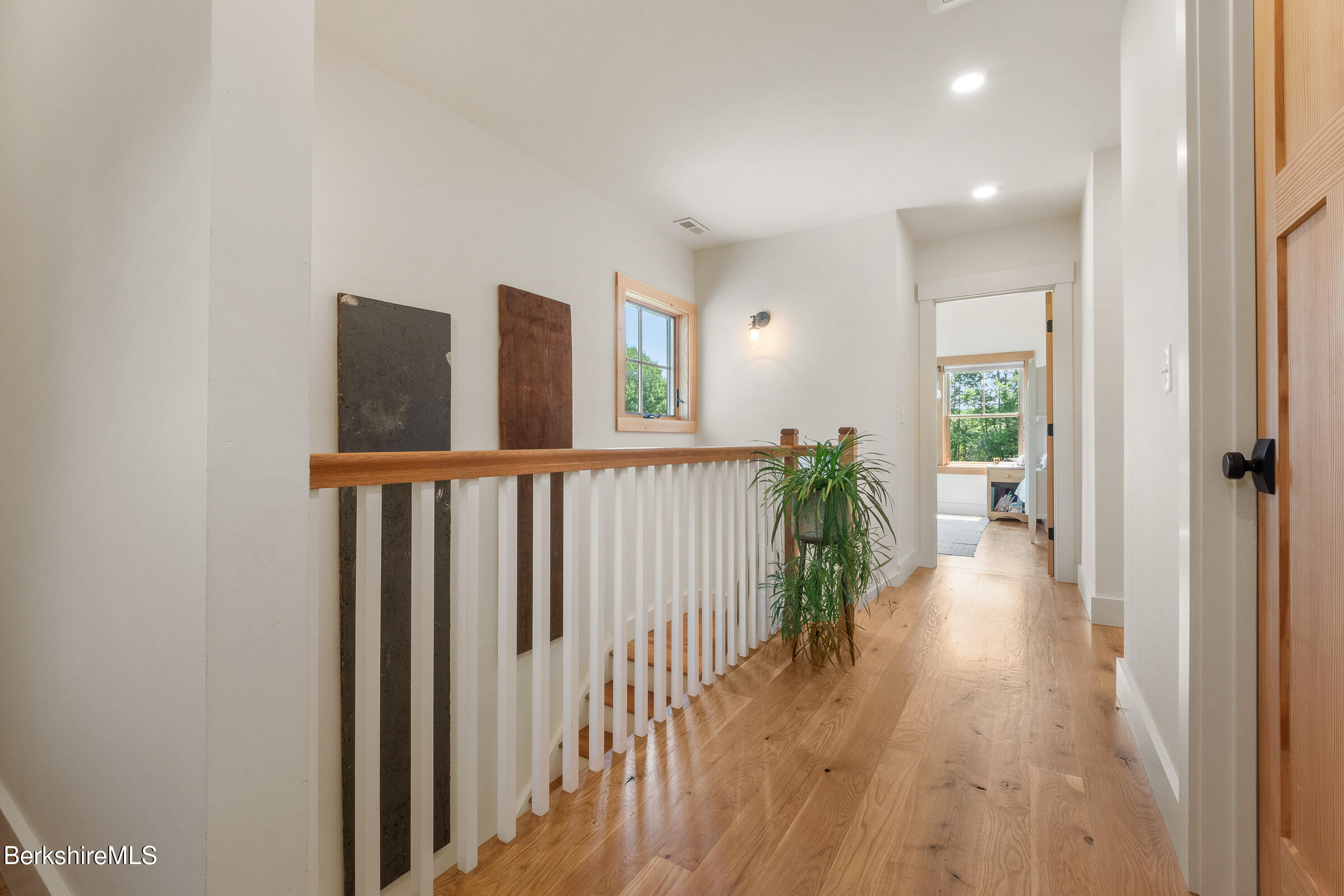 194 Sandisfield Road Sandisfield, MA 01255 - Photo 44 of 59 wooden floor in a hall with a window