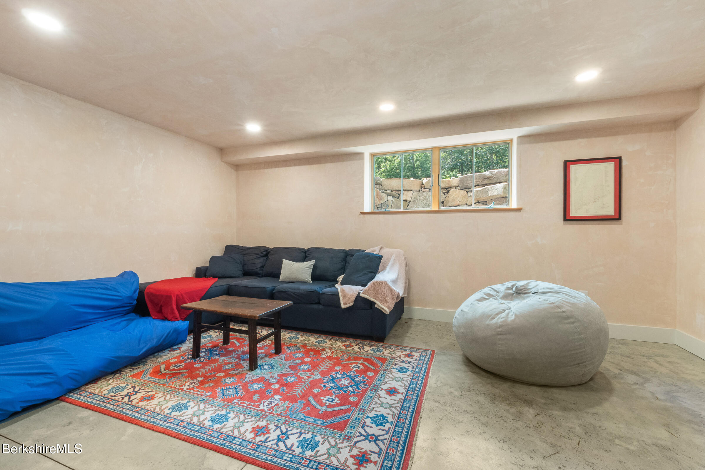 194 Sandisfield Road Sandisfield, MA 01255 - Photo 49 of 59 a living room with furniture and a rug