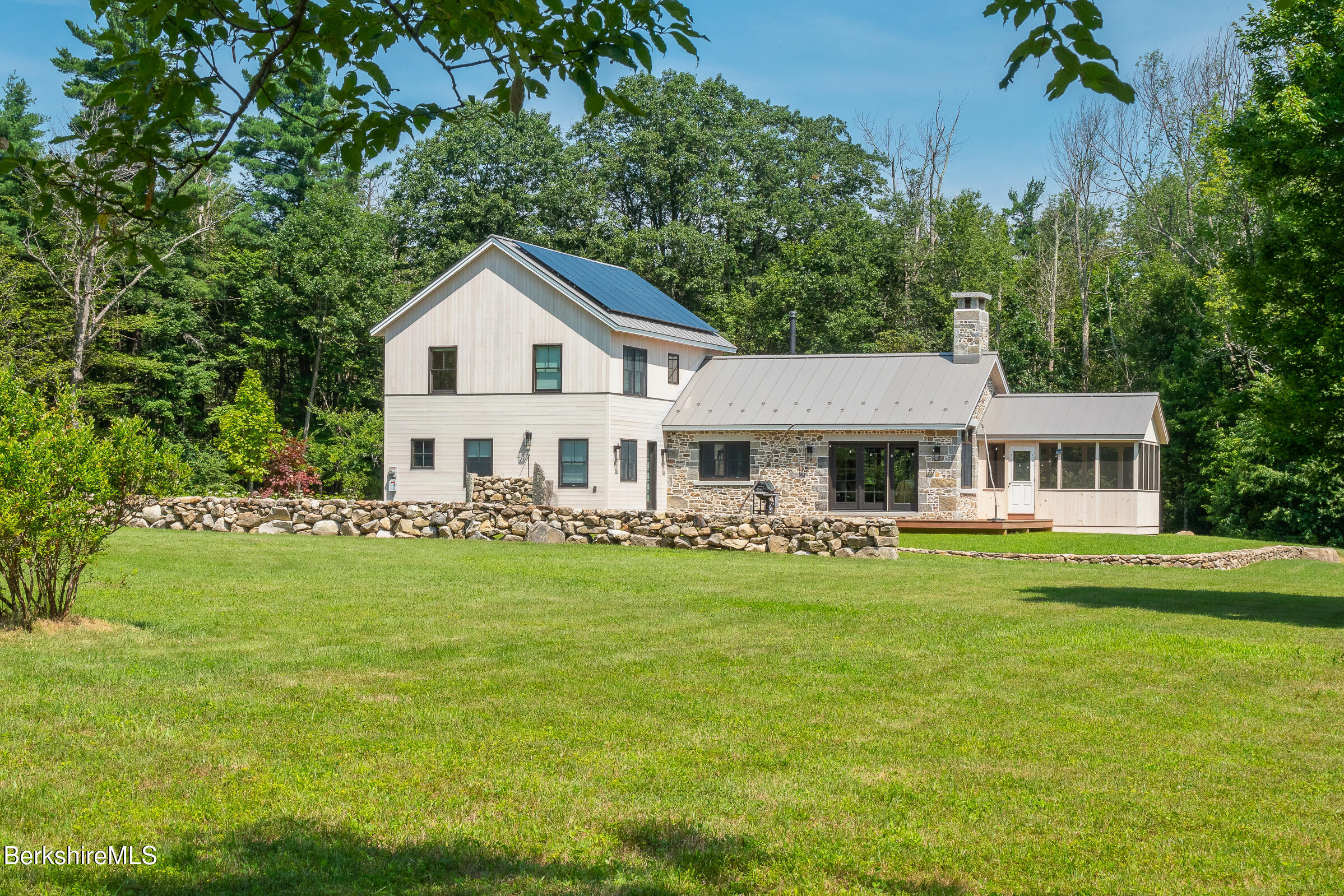 194 Sandisfield Road Sandisfield, MA 01255 - Photo 55 of 59 a front view of a house with garden