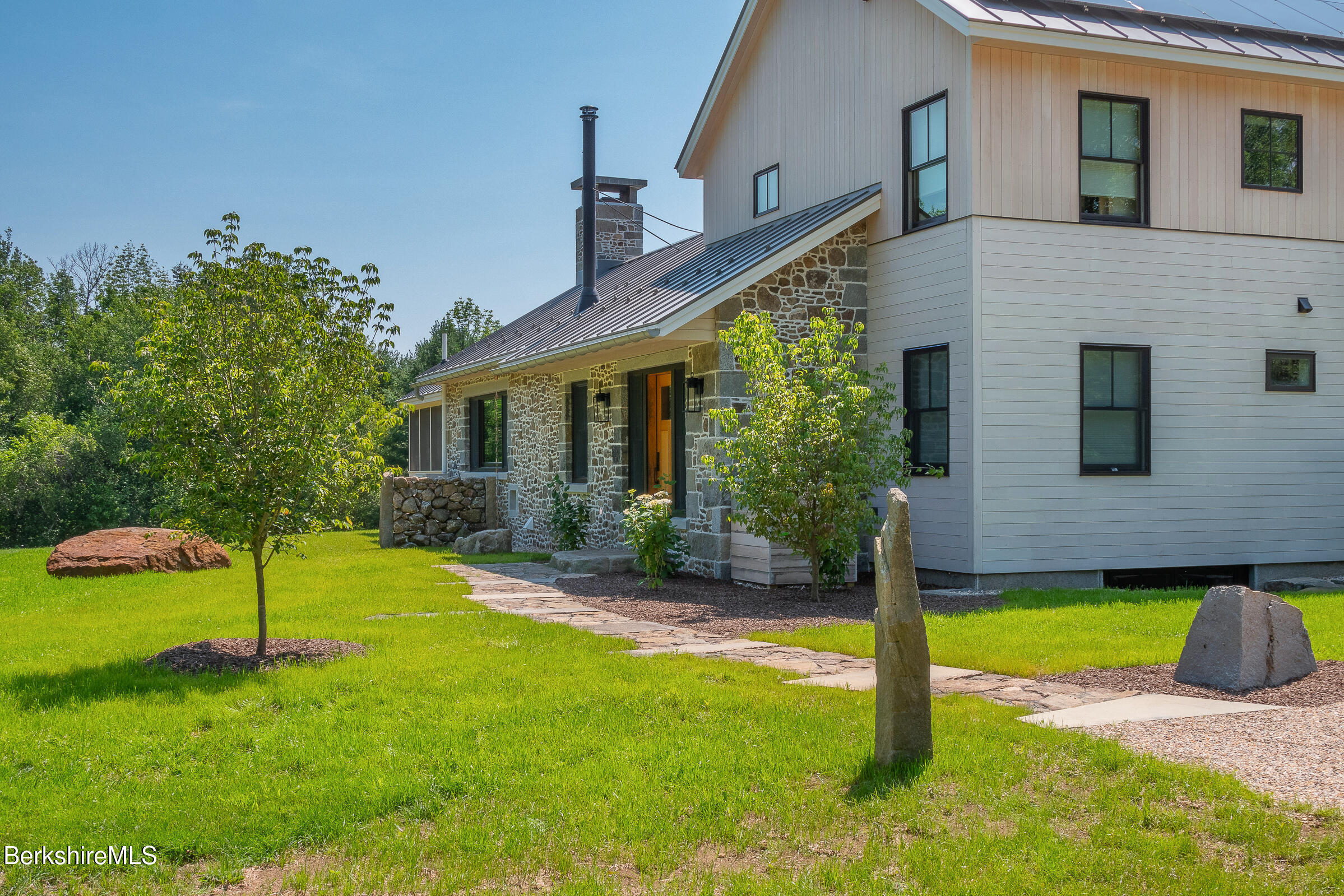 194 Sandisfield Road Sandisfield, MA 01255 - Photo 56 of 59 a view of a house with a backyard and a tree