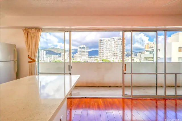 a view of a living room with a large window