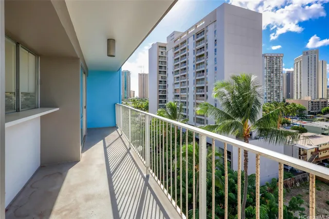 a view of a balcony with wooden floor