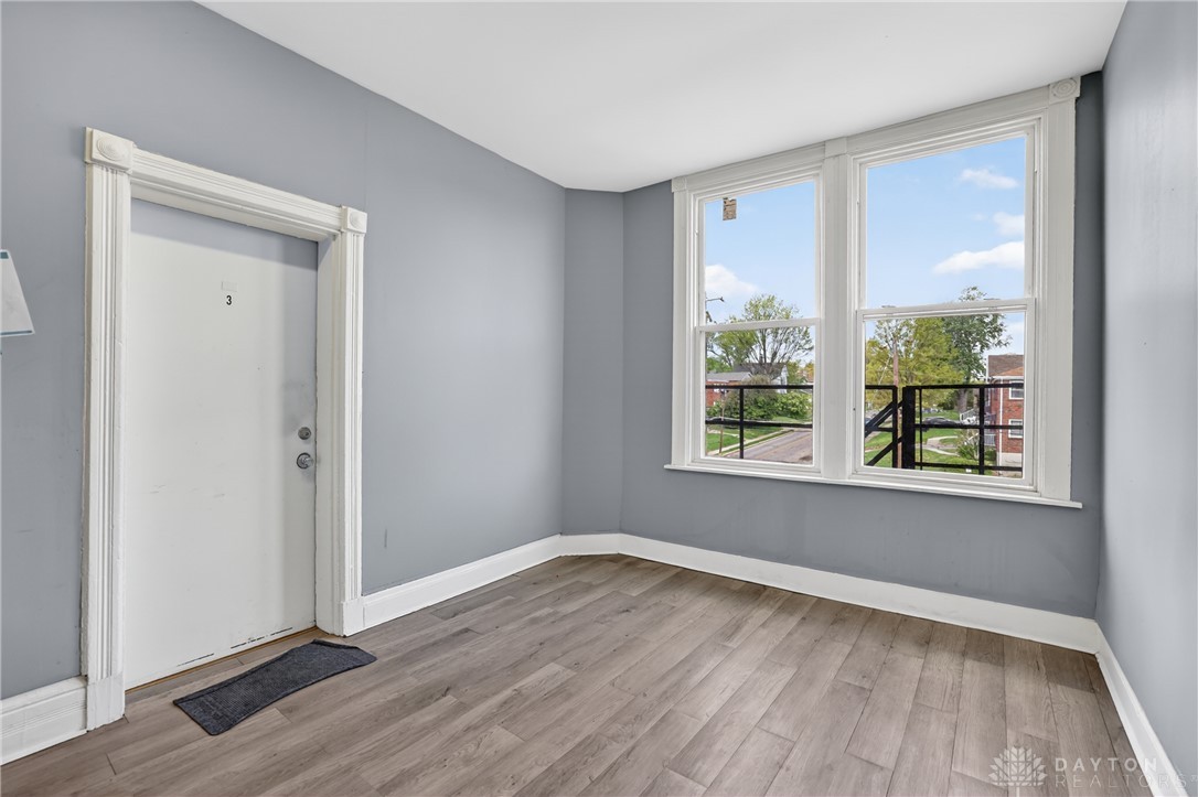 7045-7049 Montgomery Road Cincinnati, OH 45236 - Photo 30 of 68 This bright space features sleek flooring, large windows, and a classic doorway.