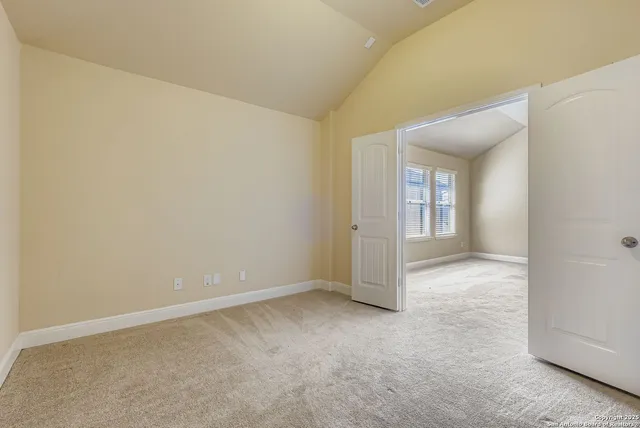 a view of a balcony with wooden floor