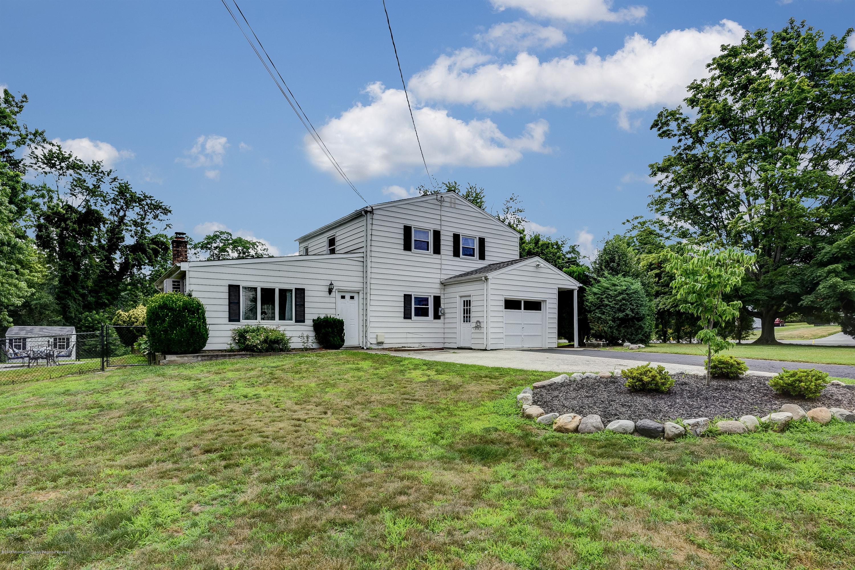53 Cherry Tree Farm Road Middletown, NJ 07748 - Photo 3 of 25 003_Side YardGarage