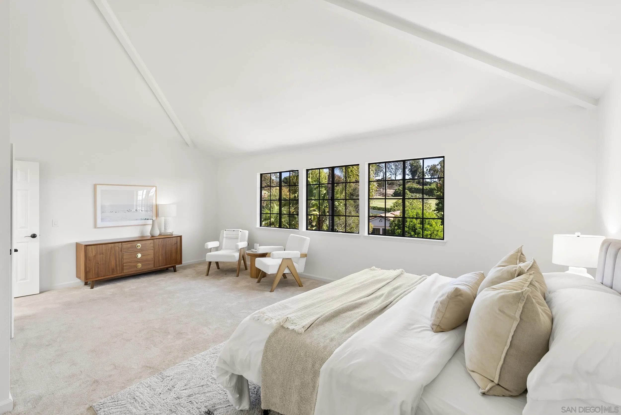 1240 Ladera Linda Del Mar, CA 92014 - Photo 16 of 35 a bedroom with a bed and a large window