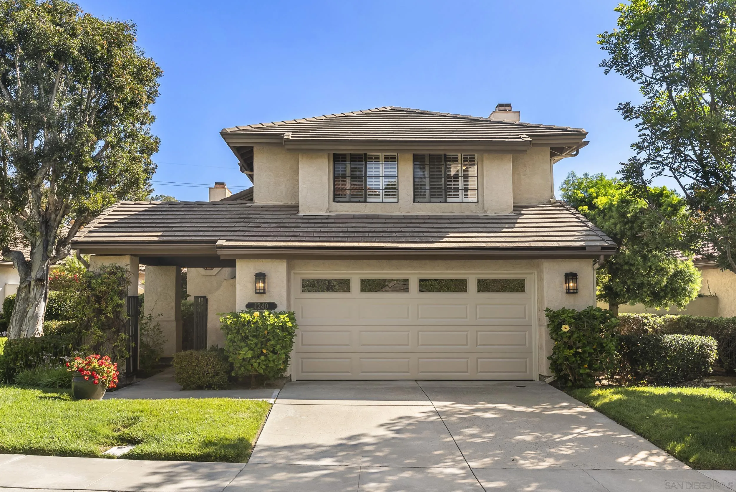 1240 Ladera Linda Del Mar, CA 92014 - Photo 24 of 35 a front view of a house with a yard