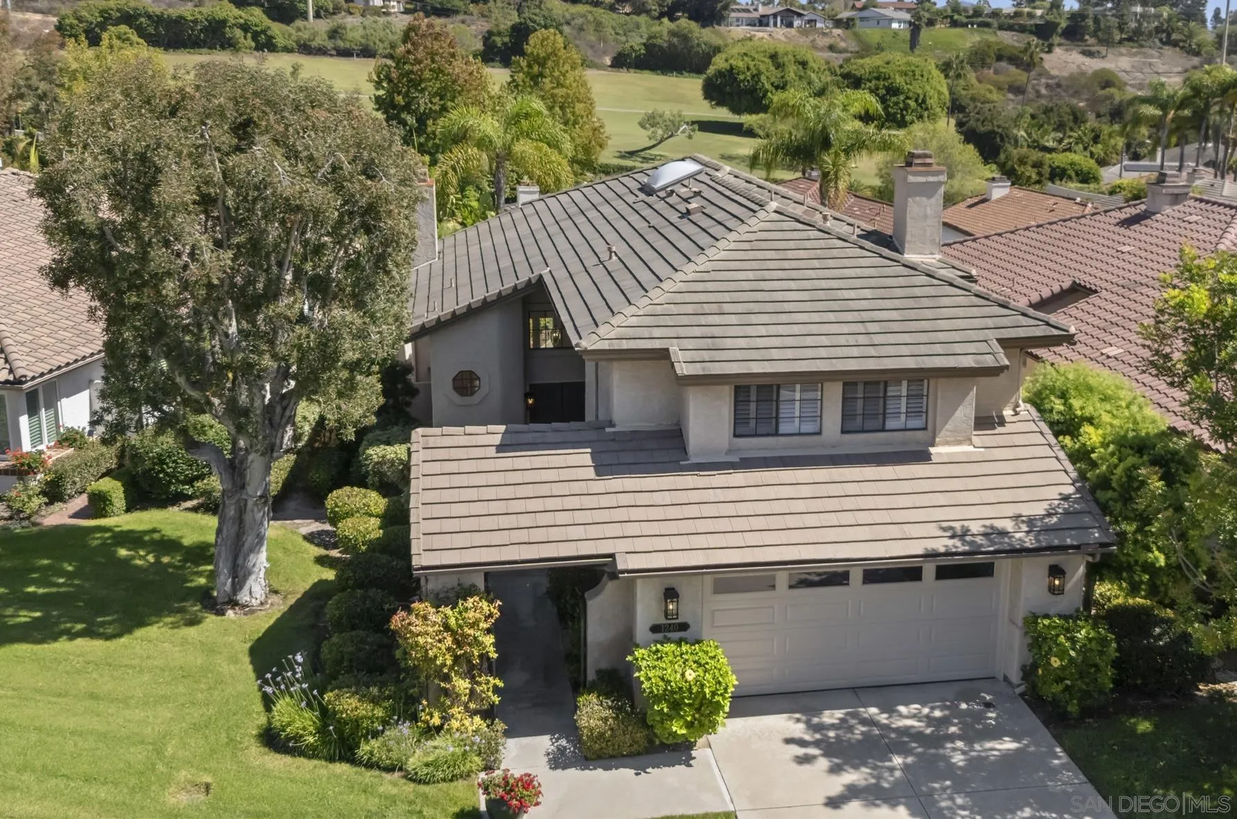 1240 Ladera Linda Del Mar, CA 92014 - Photo 30 of 35 a front view of a house with a garden