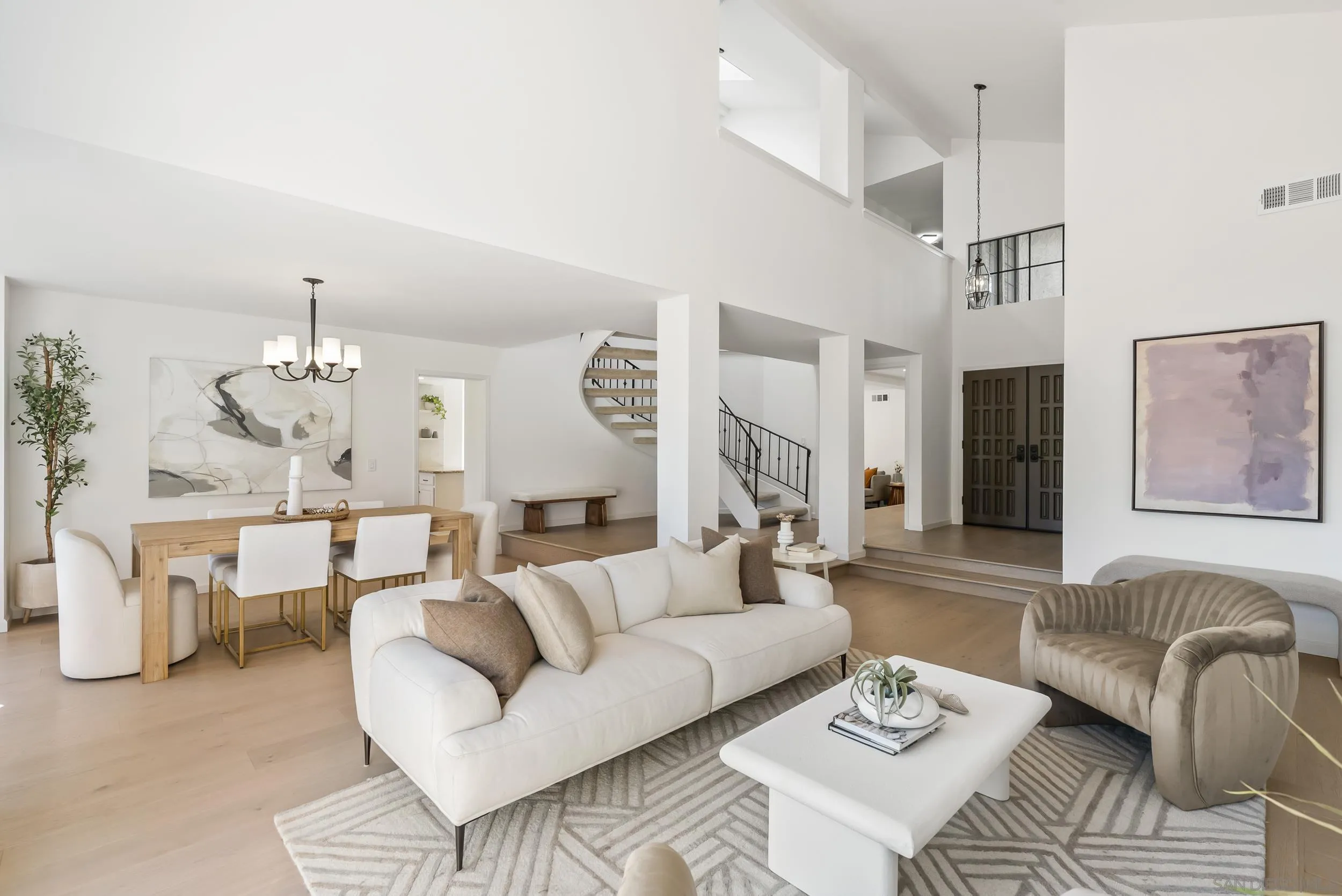 1240 Ladera Linda Del Mar, CA 92014 - Photo 4 of 35 a living room with furniture and a chandelier