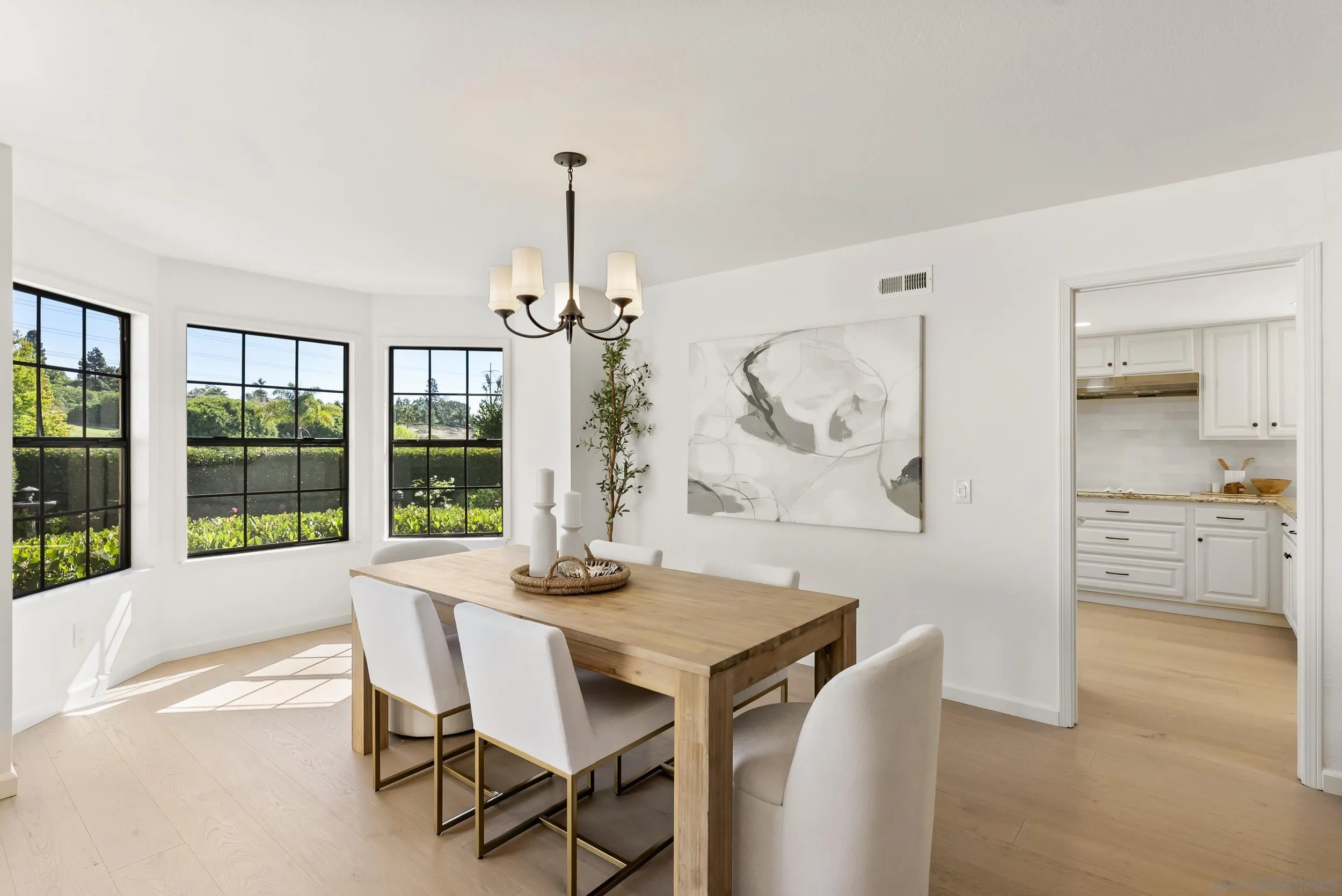 1240 Ladera Linda Del Mar, CA 92014 - Photo 5 of 35 a view of a dining room with furniture window and outside view