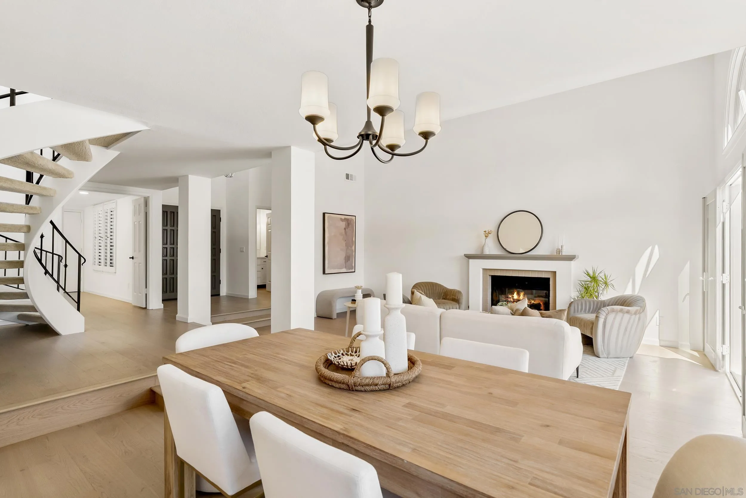 1240 Ladera Linda Del Mar, CA 92014 - Photo 6 of 35 a view of a dining room and a kitchen with a table chairs