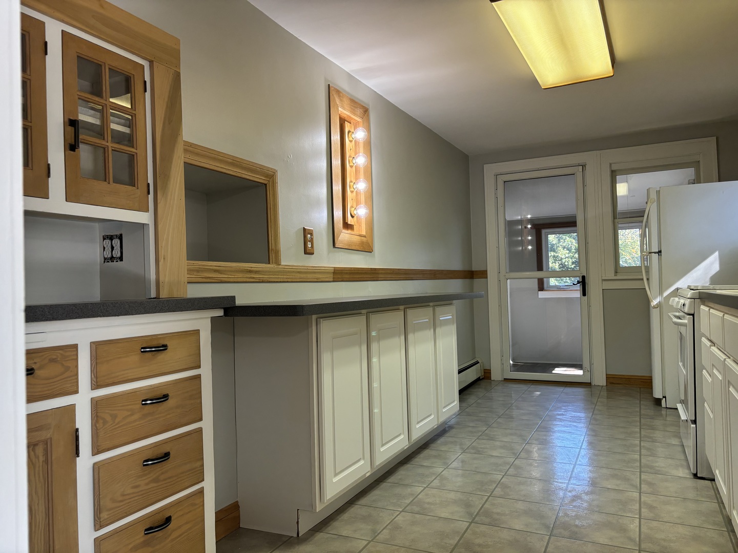 912 Clay Street Woodstock, IL 60098 - Photo 14 of 15 a view of walk in closet with window