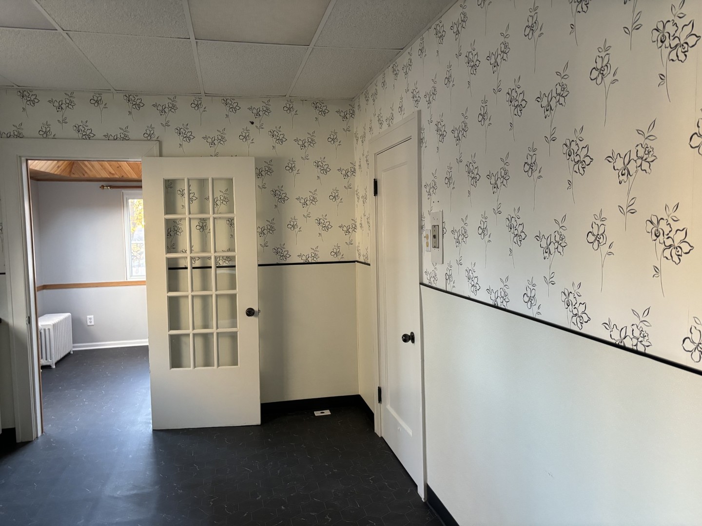912 Clay Street Woodstock, IL 60098 - Photo 3 of 15 a view of empty room with wooden floor and cabinet