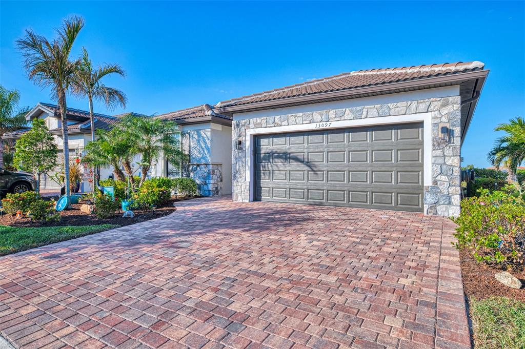 13097 Rinella Street Venice, FL 34293 - Photo 1 of 1 Welcome to the Summerwood at 13097 Rinella. Attractive stone veneer added to home.