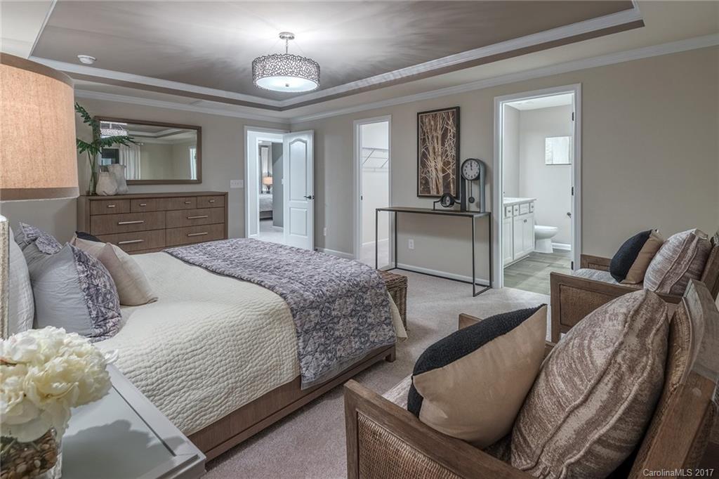 257 Keating Pl Drive, Unit 46 Fort Mill, SC 29708 - Photo 6 of 24 a bedroom with a bed and window