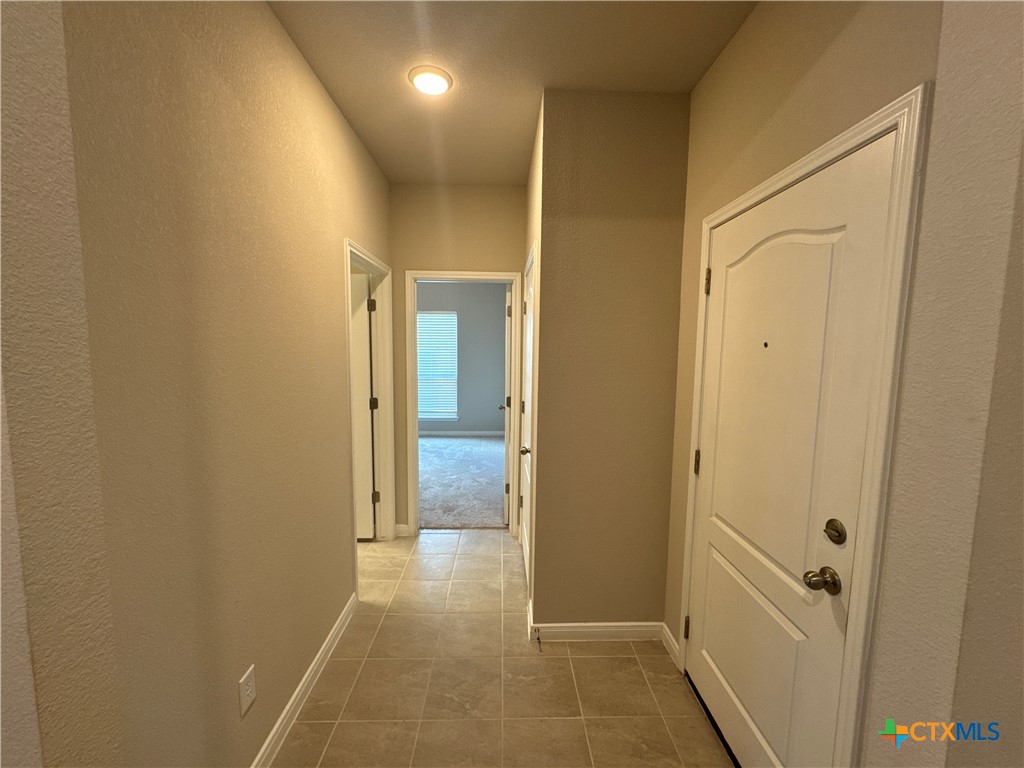 2214 Wasabi Road Temple, TX 76501 - Photo 18 of 26 a view of a hallway with wooden floor
