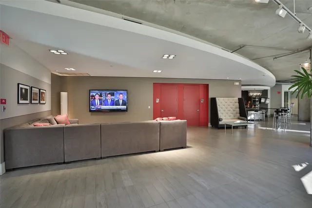 a kitchen with sink and refrigerator
