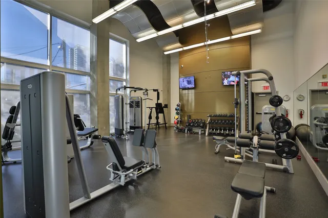 a view of a building with sitting area