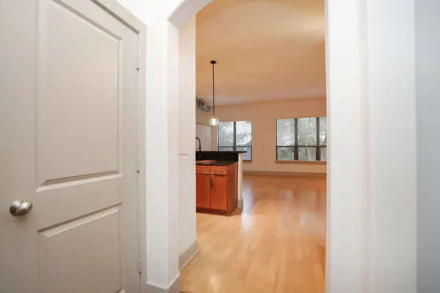 a view of an empty room with a window