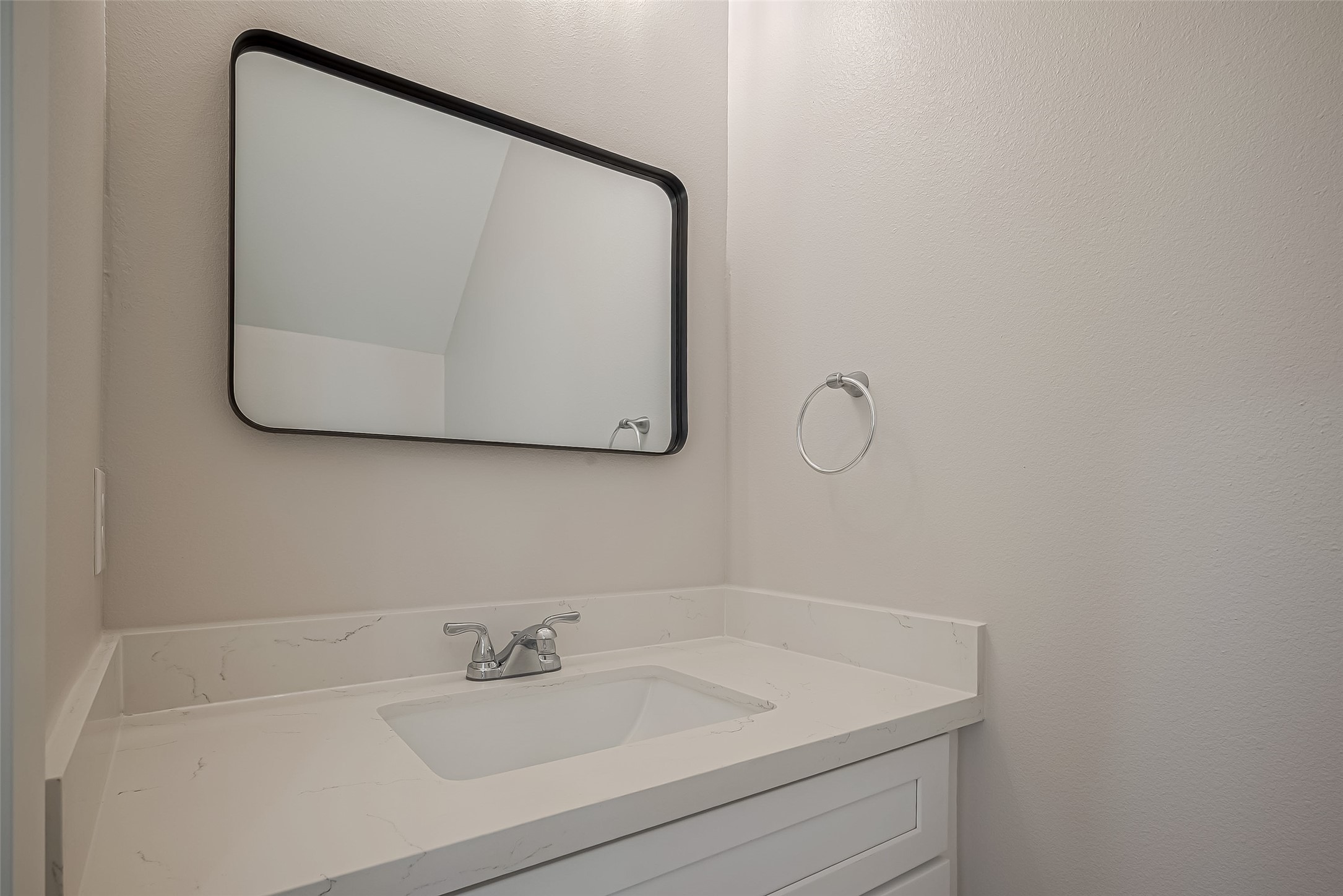 918 St Clair Street, Unit B Houston, TX 77088 - Photo 17 of 35 a bathroom with a sink and mirror