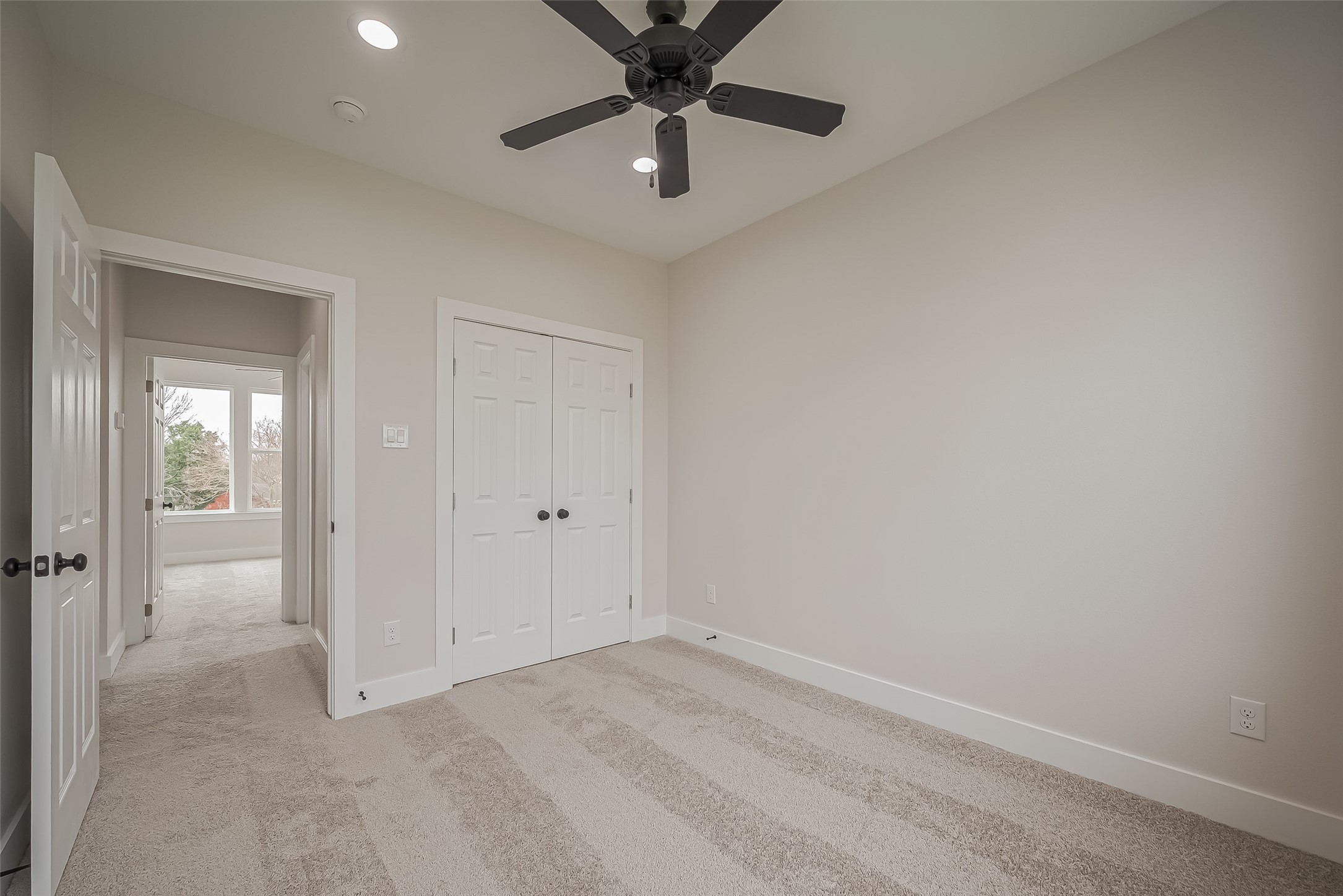 918 St Clair Street, Unit B Houston, TX 77088 - Photo 22 of 35 wooden floor in an empty room and a window
