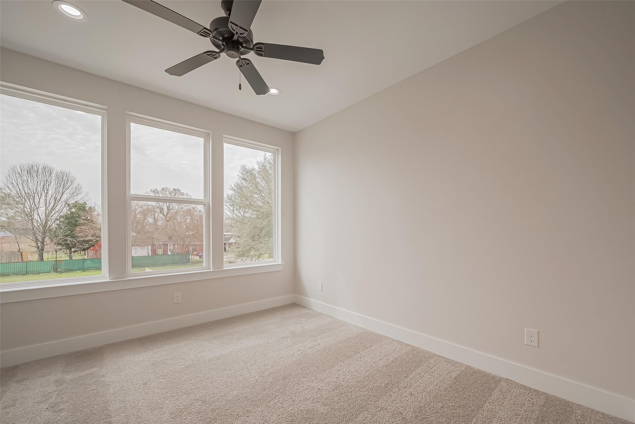918 St Clair Street, Unit B Houston, TX 77088 - Photo 25 of 35 a view of an empty room with a window