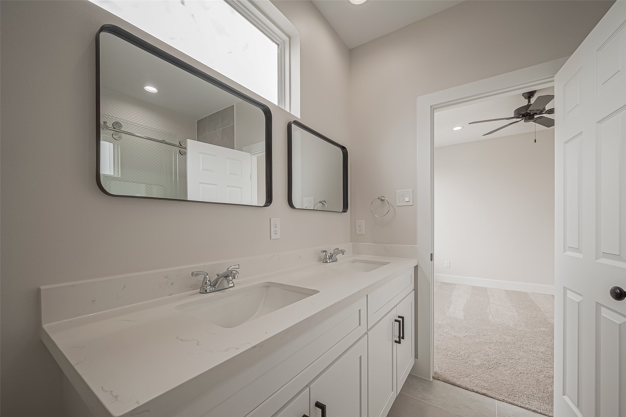 918 St Clair Street, Unit B Houston, TX 77088 - Photo 29 of 35 a bathroom with a sink and a mirror