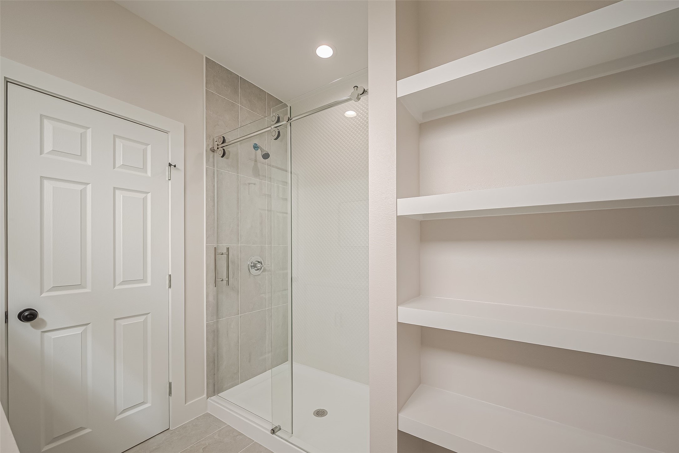 918 St Clair Street, Unit B Houston, TX 77088 - Photo 30 of 35 a bathroom with a shower