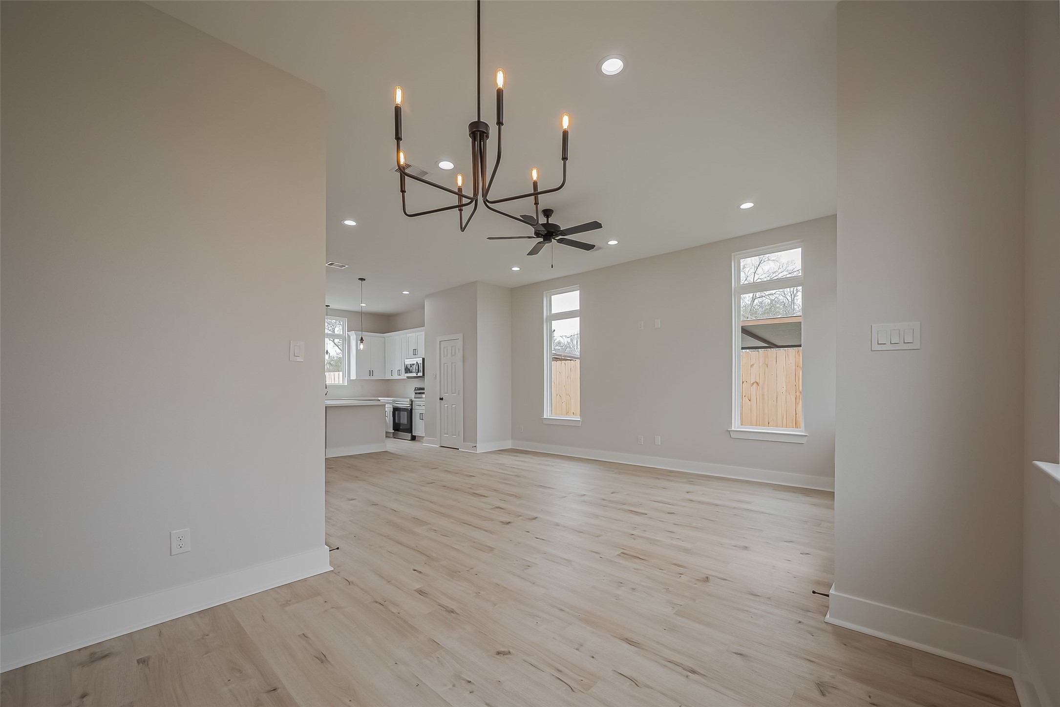 918 St Clair Street, Unit B Houston, TX 77088 - Photo 9 of 35 a view of an empty room with a kitchen