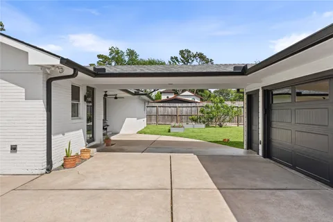 a view of garage and yard