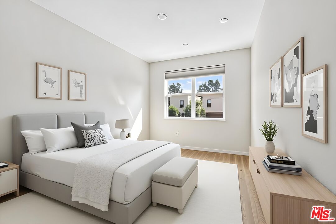 692 Colorado Circle Carson, CA 90745 - Photo 16 of 35 a bedroom with a bed and a desk