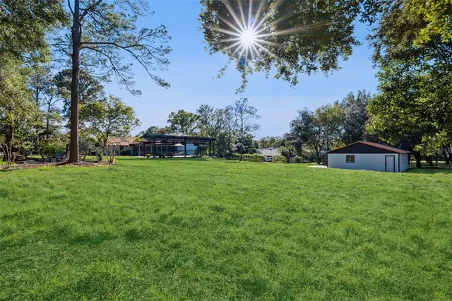 a view of a backyard with a garden