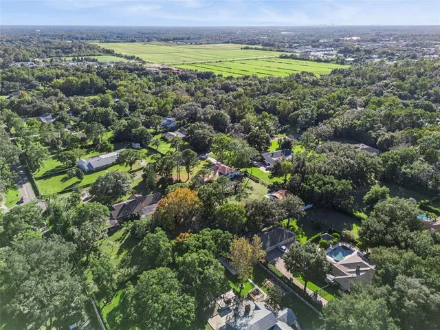 a view of a house with a big yard