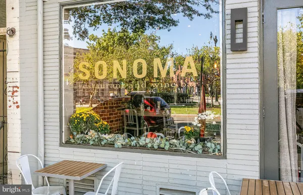 a view of outside area with a sign board