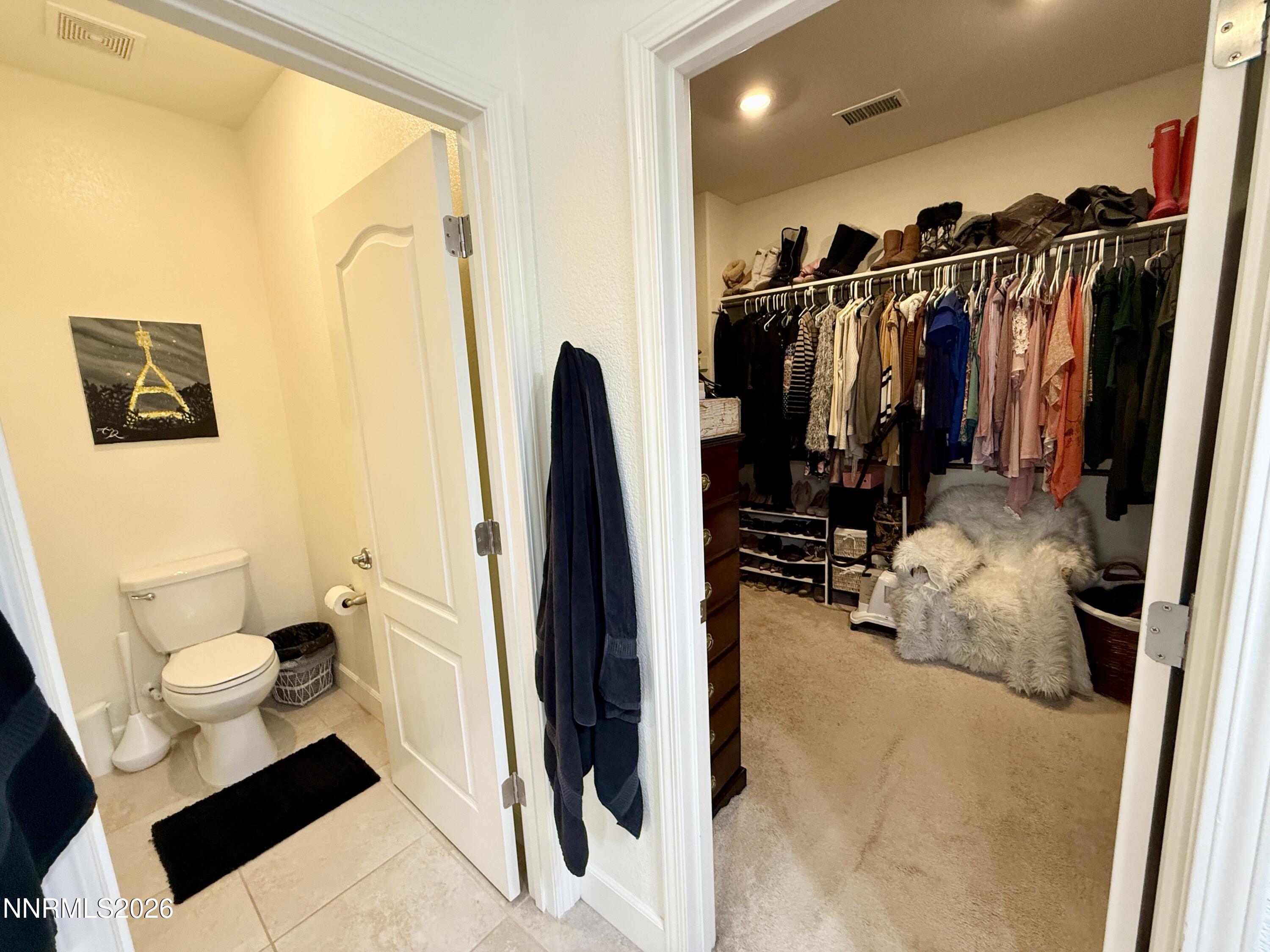 9766 Pachuca Drive Reno, NV 89521 - Photo 31 of 59 a view of walk in closet with clothes and shoes
