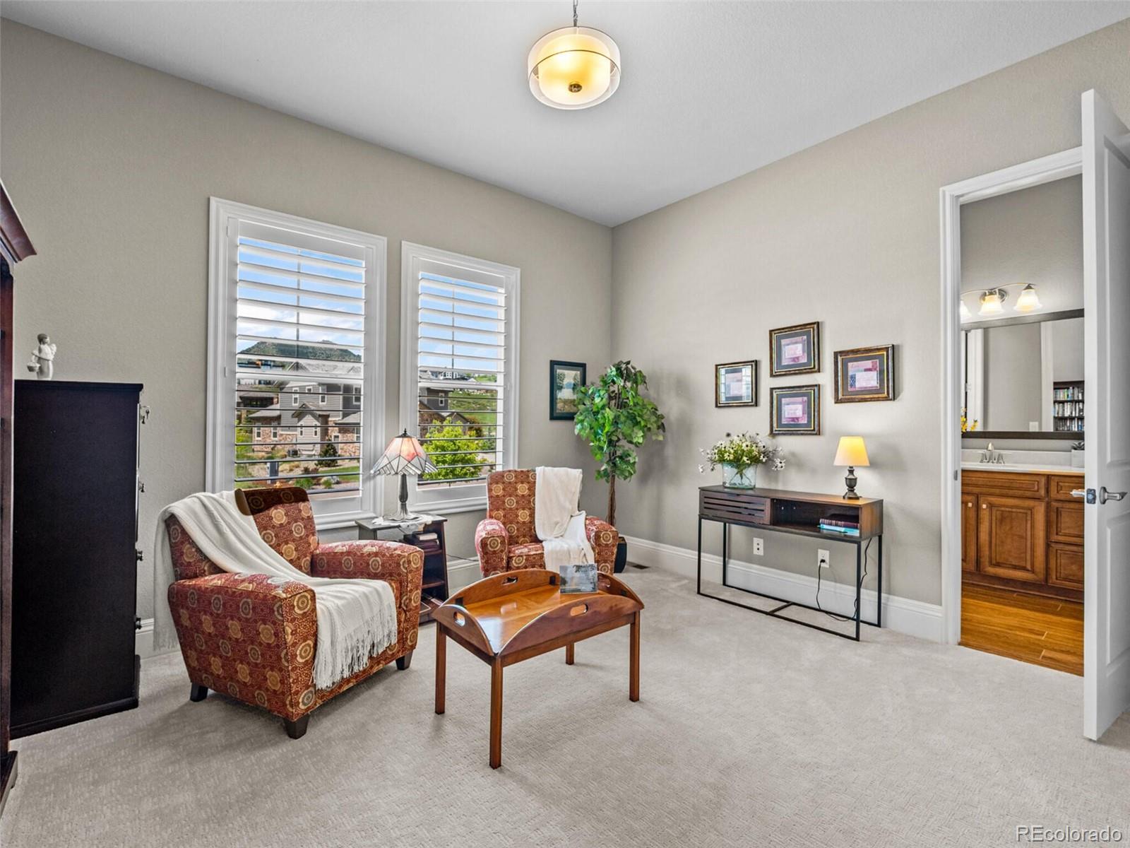 14945 Lyons Ridge Drive Morrison, CO 80465 - Photo 23 of 40 a living room with furniture and a area