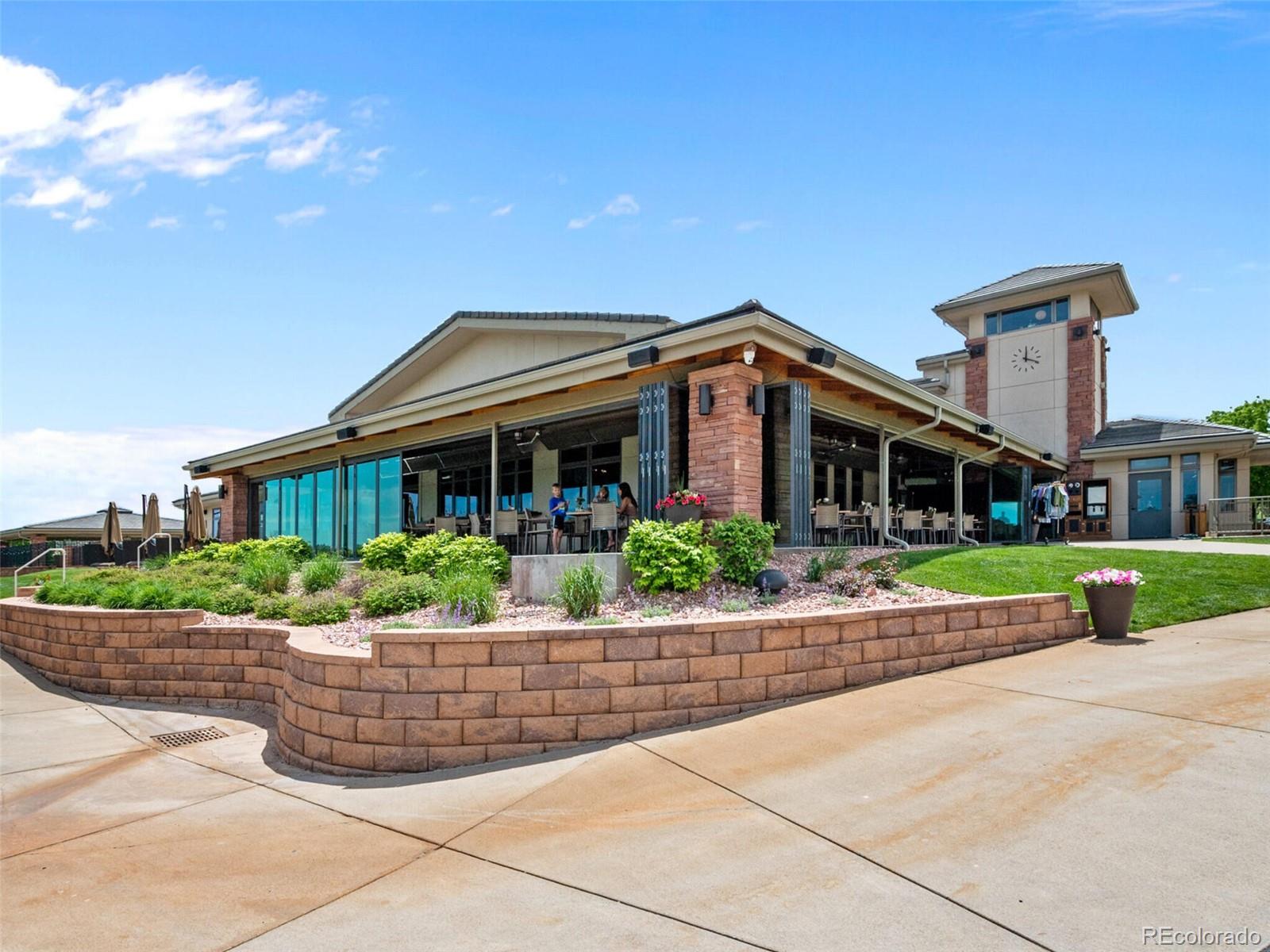 14945 Lyons Ridge Drive Morrison, CO 80465 - Photo 37 of 40 a front view of house with a yard