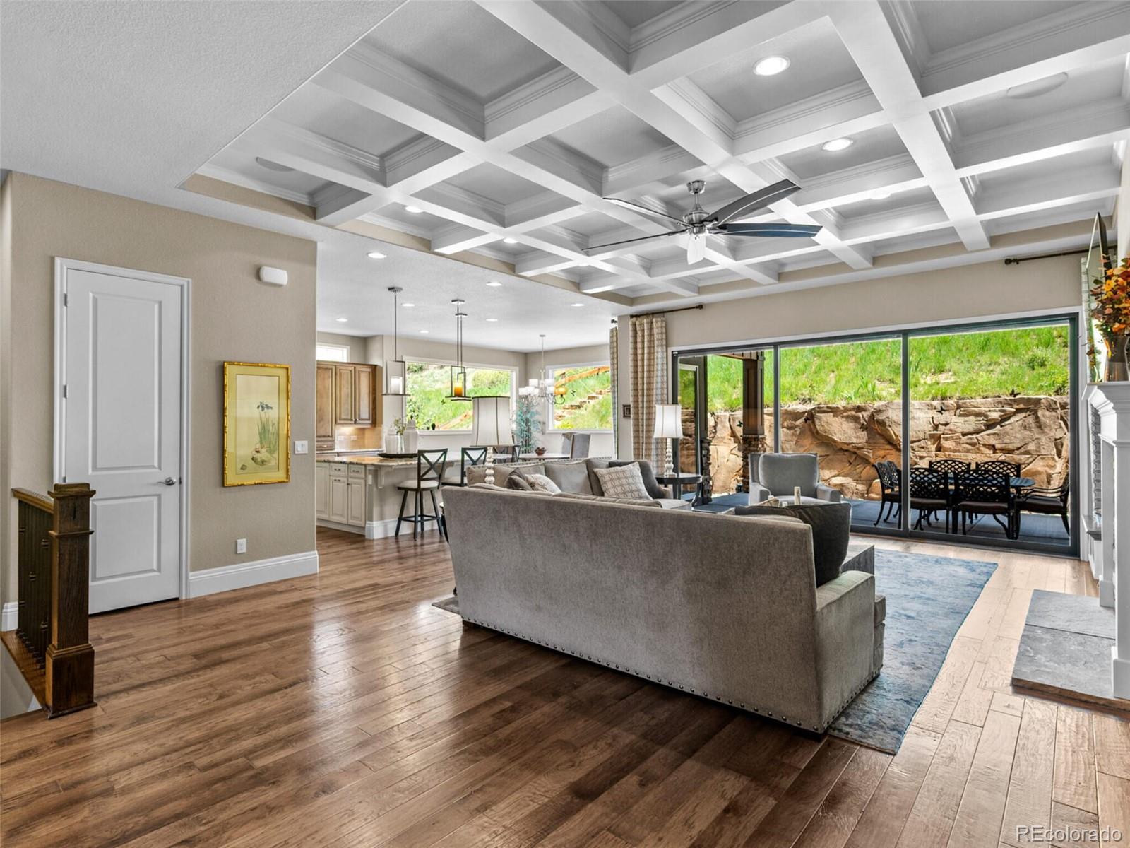 14945 Lyons Ridge Drive Morrison, CO 80465 - Photo 6 of 40 a living room with furniture and a large window with outer view