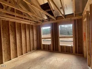 a view of balcony with wooden floor