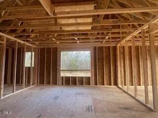 a view of a livingroom with a staircase
