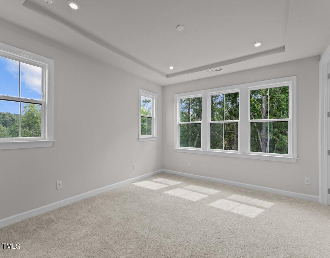 4822 Cypress Tree Lane, Unit 1 Raleigh, NC 27612 - Photo 19 of 33 Primary Bedroom
