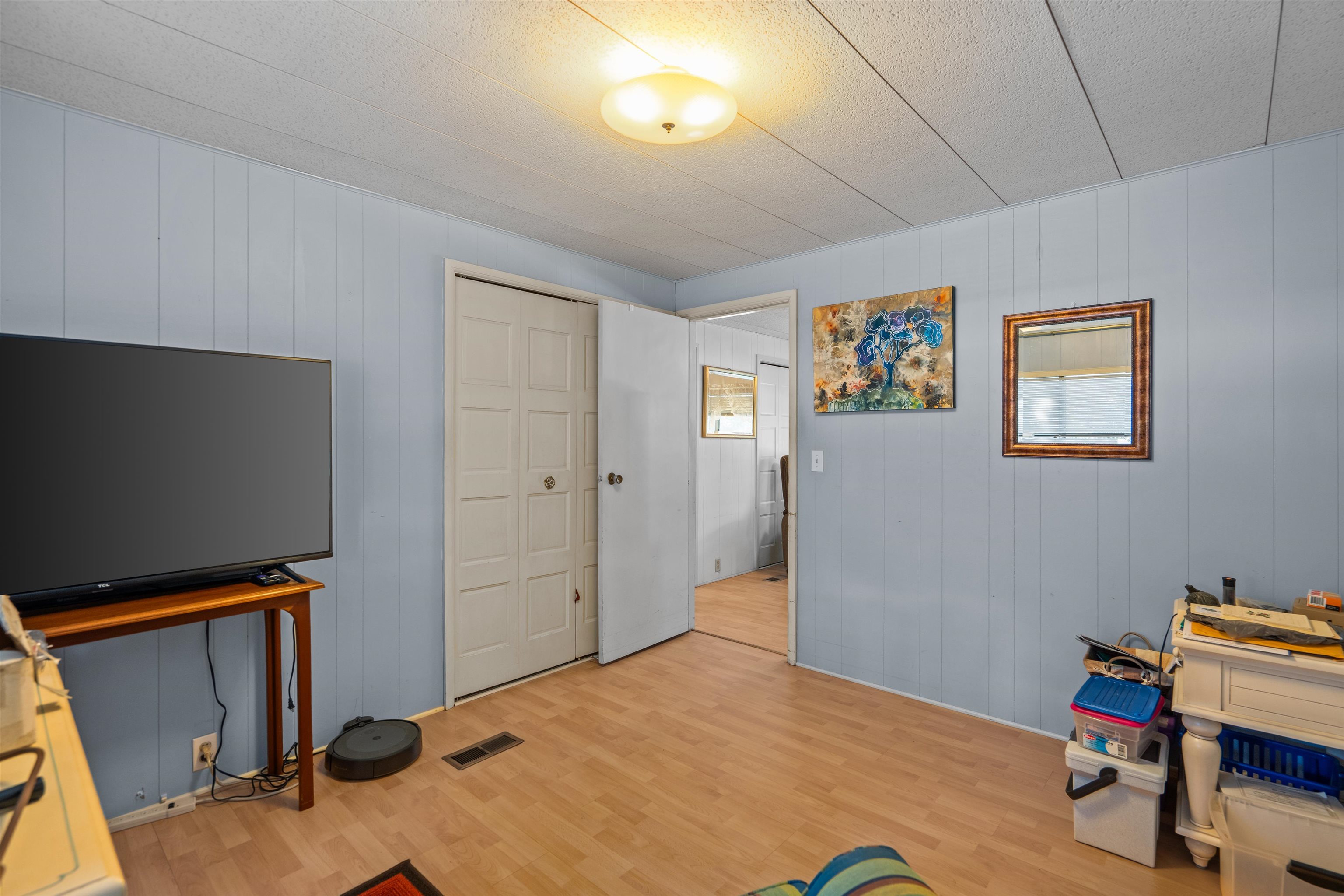 3979 Oak Terrace Road St. Augustine, FL 32086 - Photo 16 of 36 a bedroom with a bed and furniture