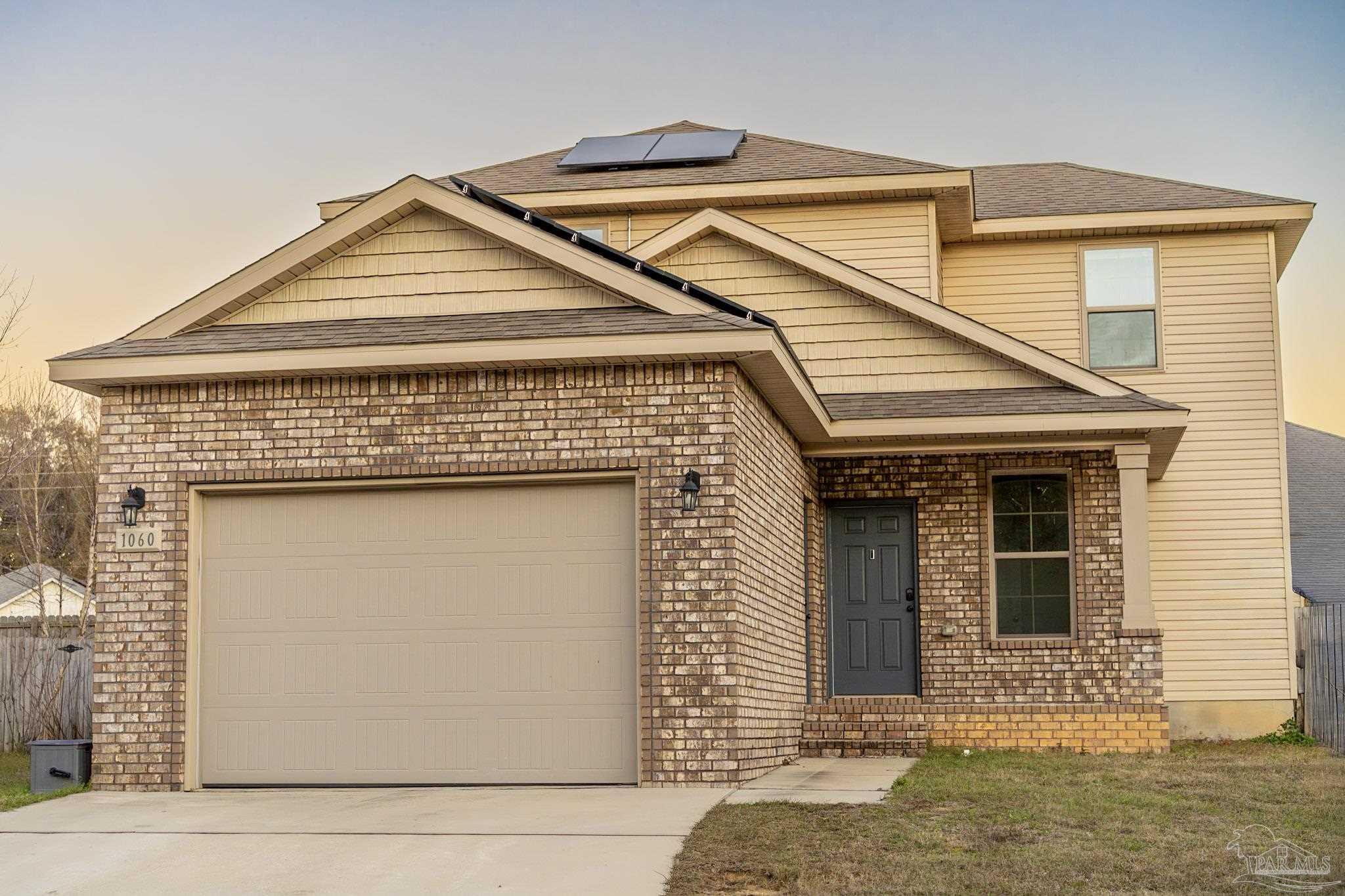 1060 Bretts Way Cantonment, FL 32533 - Photo 32 of 32 a front view of a house