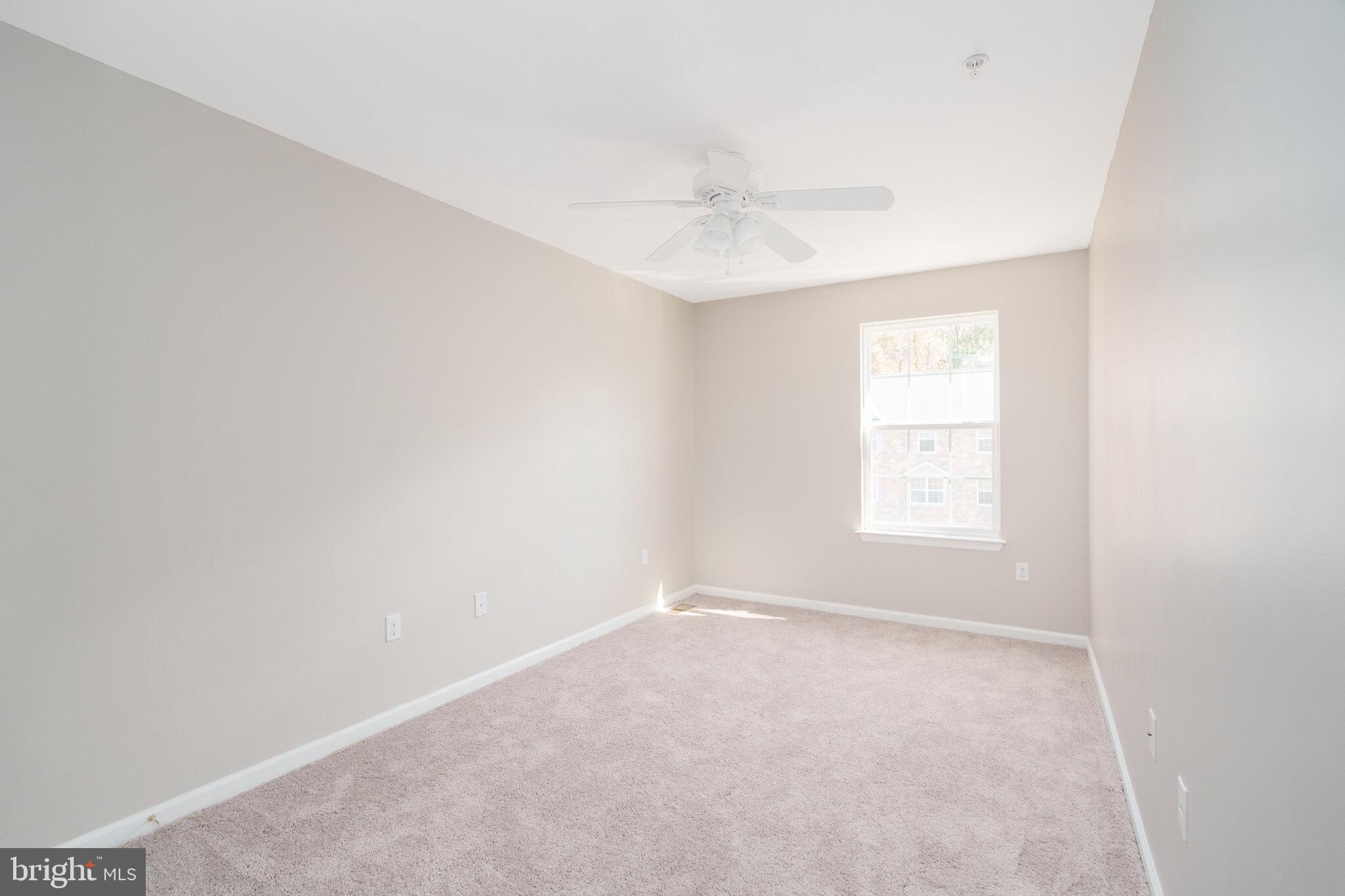112 Ben Boulevard Elkton, MD 21921 - Photo 15 of 22 an empty room with a window and a fan