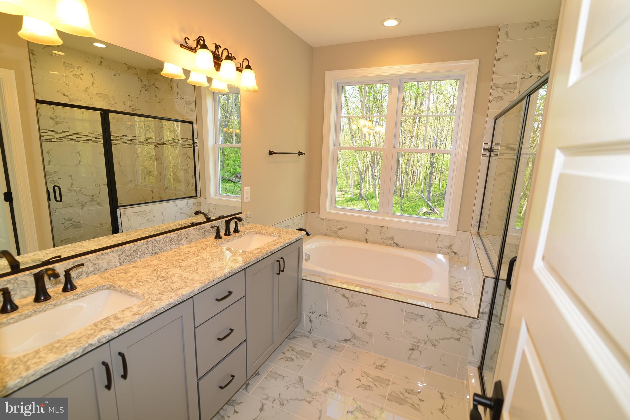 8700 Green Valley Road Union Bridge, MD 21791 - Photo 12 of 40 Master Bath dbl vanity w/granite & porcelain tile